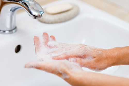 Person washing their hands